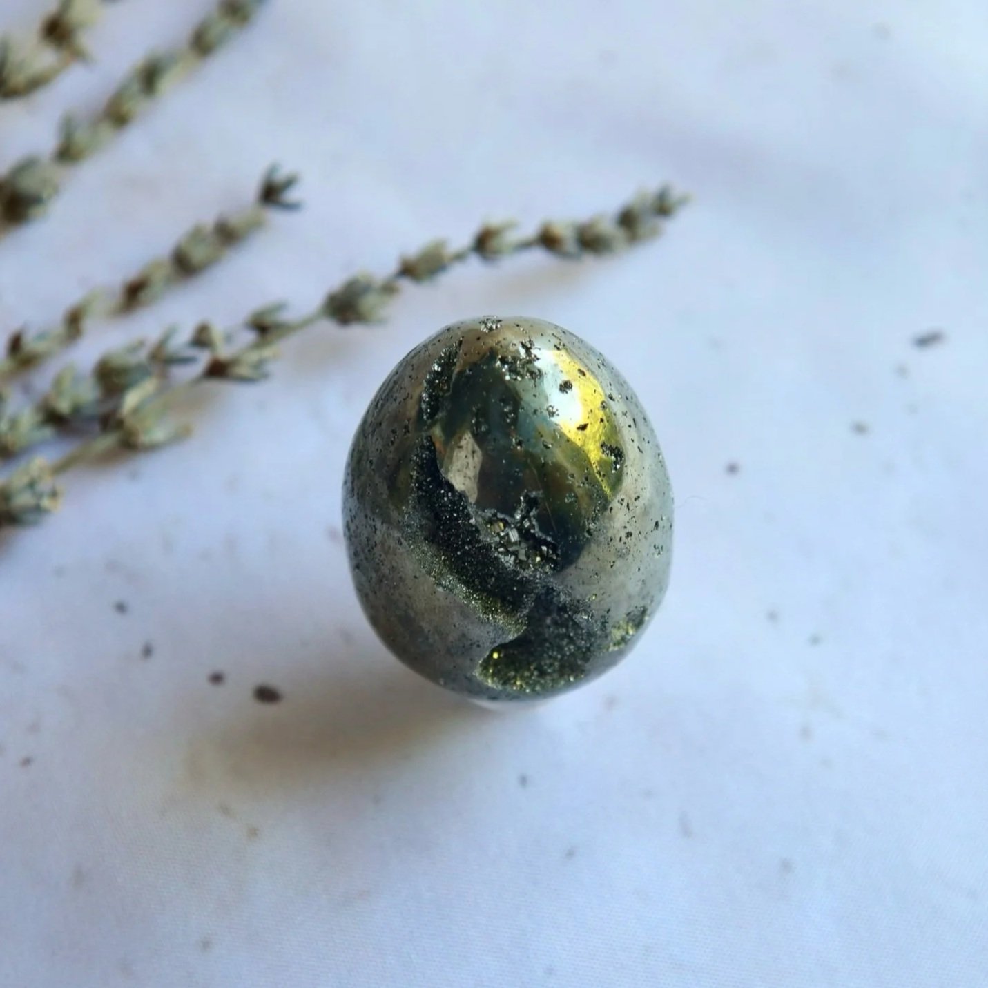 Exact Pyrite crystal egg showing natural metallic surface variations