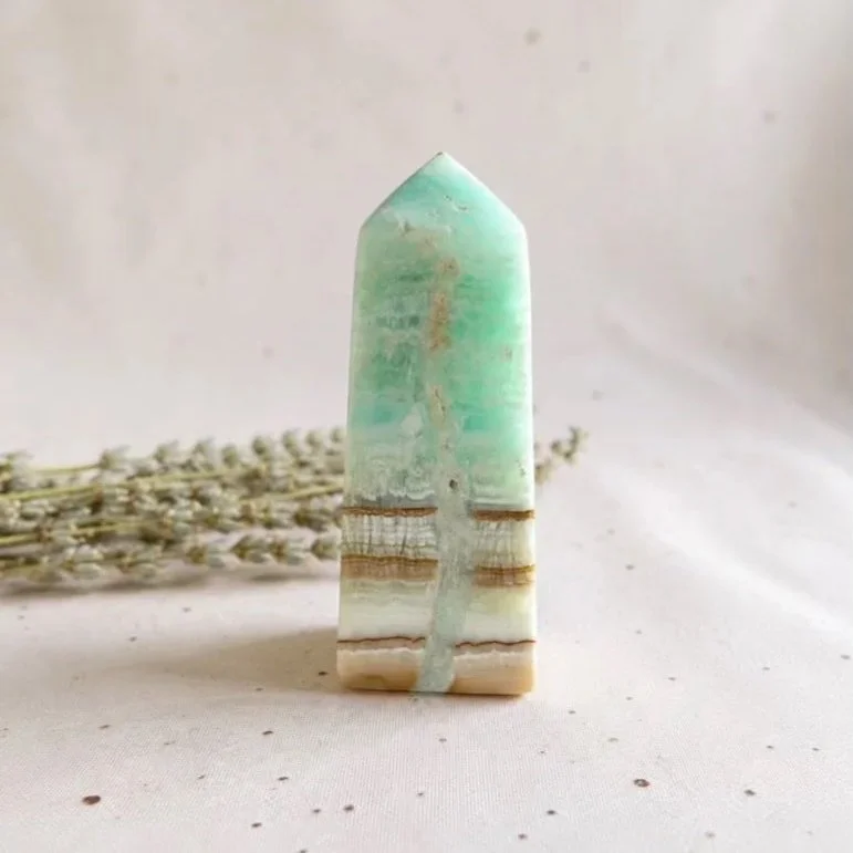Caribbean Calcite crystal tower, polished natural crystal point measuring approximately 8.5cm tall.