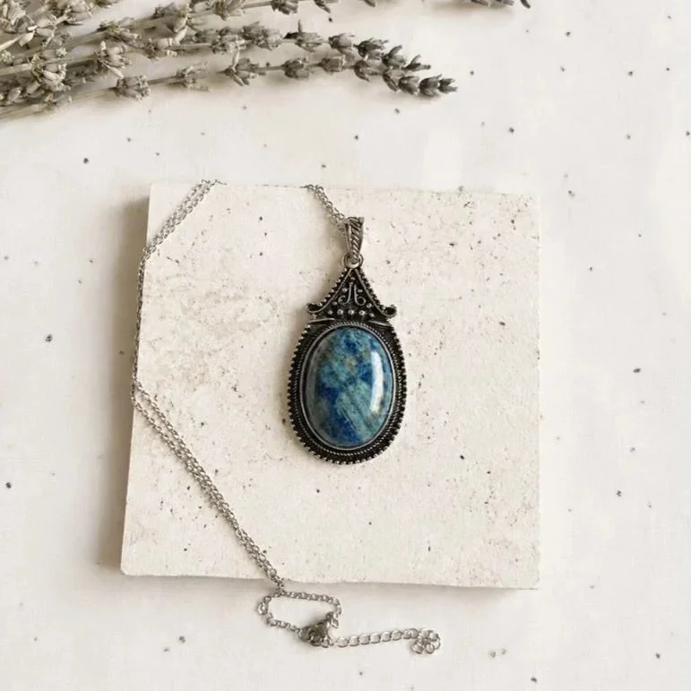 Natural Lapis Lazuli crystal necklace measuring approximately 55mm tall plus bail