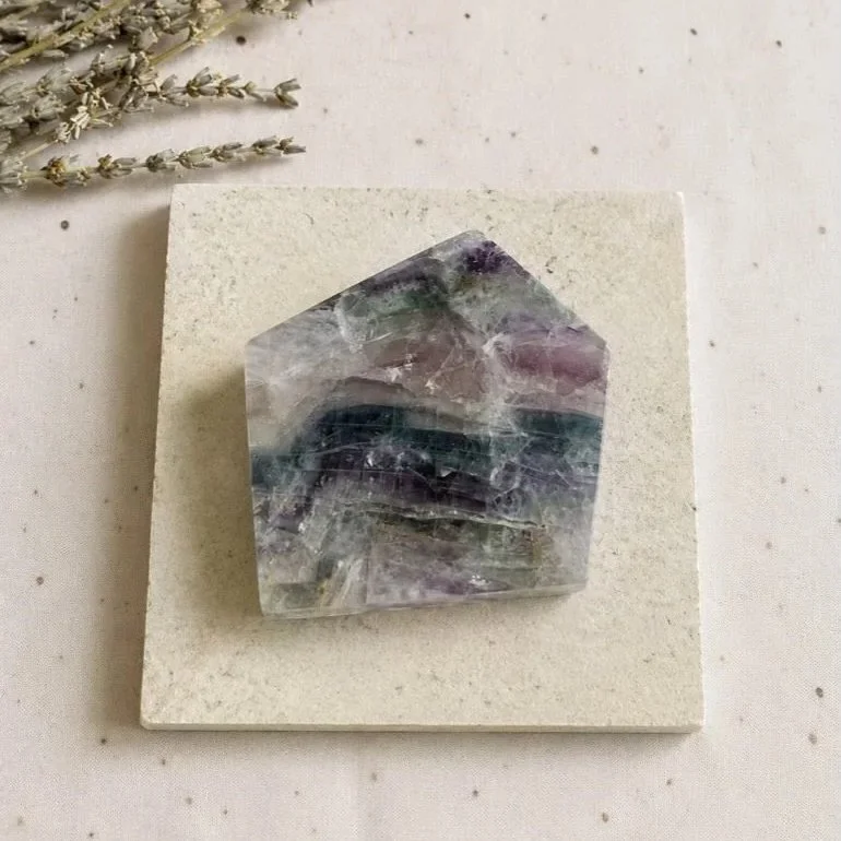 Polished Fluorite crystal slab displaying natural colour banding and unique patterns for display and collection purposes