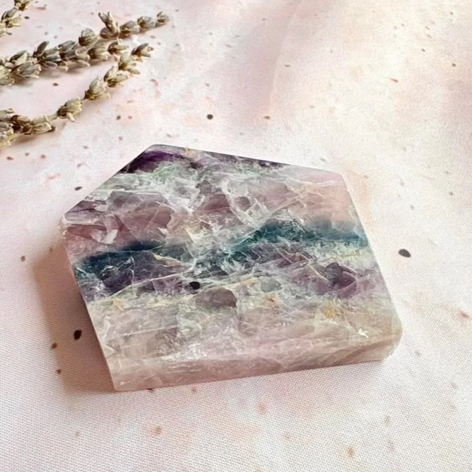 Natural polished Fluorite slab featuring green, purple, and clear tones