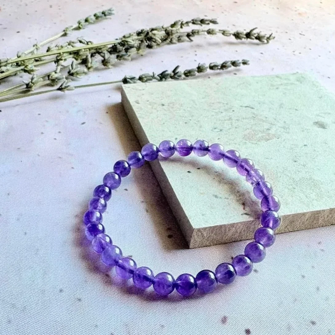 Amethyst bracelet associated with relaxation, peaceful sleep, and intuition