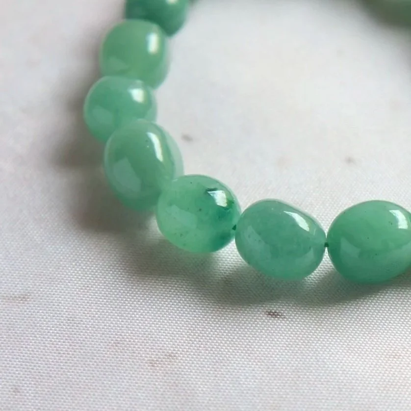 Natural Green Aventurine crystal bracelet with rounded tumble beads and subtle mineral variations