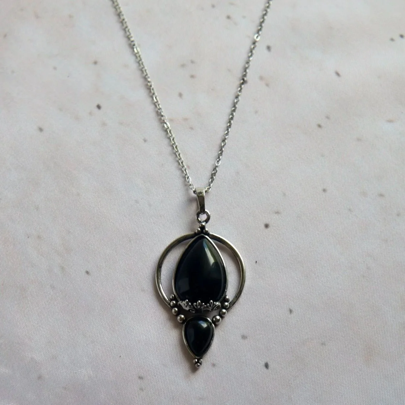 Natural Black Onyx necklace with antique silver-toned pendant setting