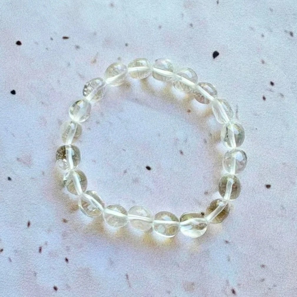 Natural Clear Quartz bead bracelet featuring beads between 8mm and 12mm in size
