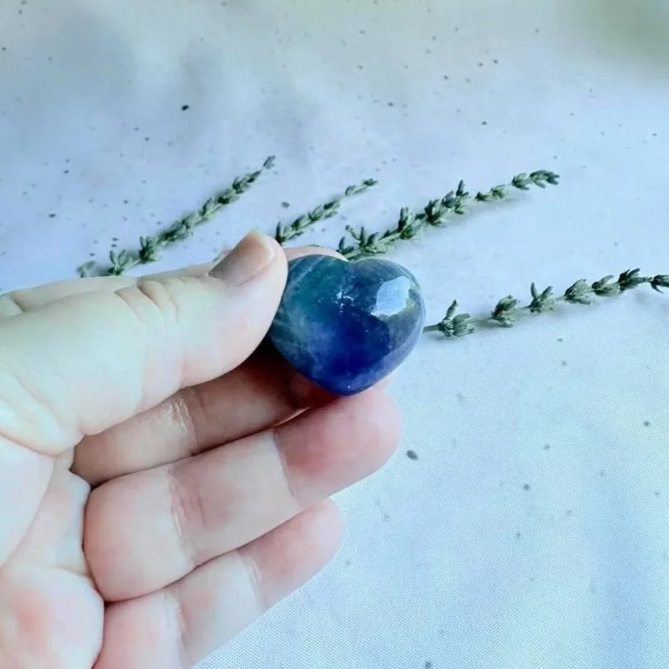Polished Amethyst crystal puff heart with a smooth finish