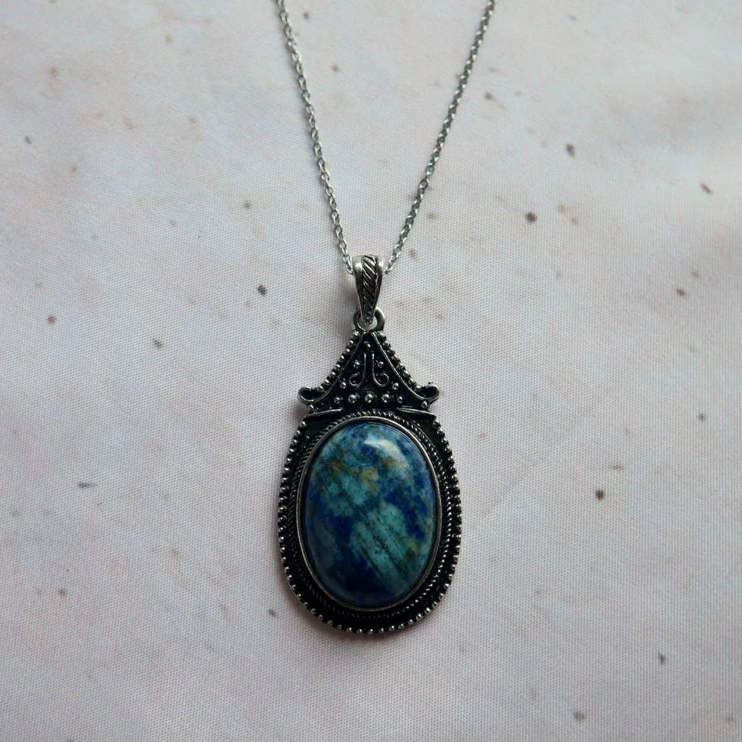 Lapis Lazuli oval necklace with natural deep blue gemstone pendant and antique silver-toned setting