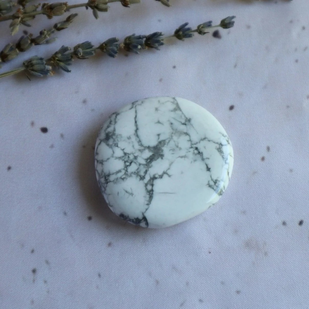 Polished Howlite flat stone with natural grey veining