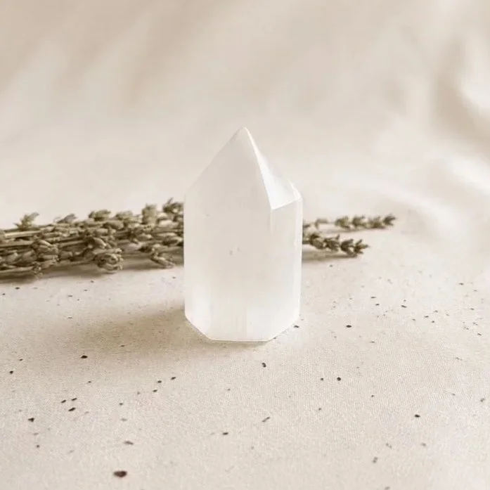 Natural Satin Spar crystal tower measuring approximately 6cm tall with a silky white appearance