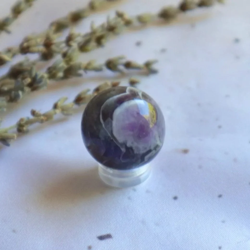Chevron Amethyst crystal sphere with natural chevron banding
