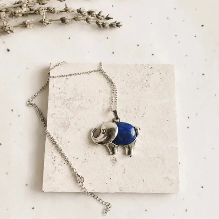 Natural Lapis Lazuli crystal necklace measuring approximately 40mm wide and 25mm tall