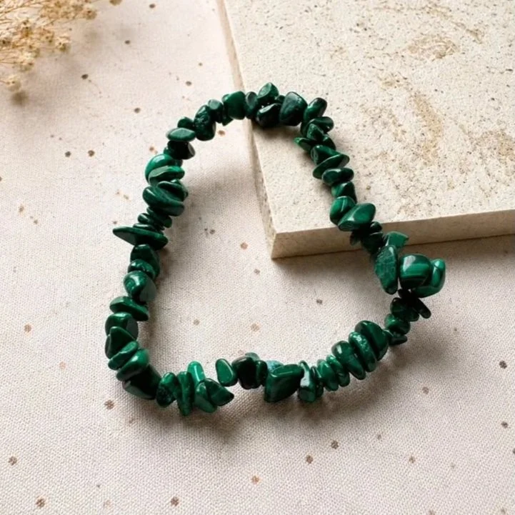 Natural Malachite chip bracelet featuring vibrant green crystal chips on stretch cord