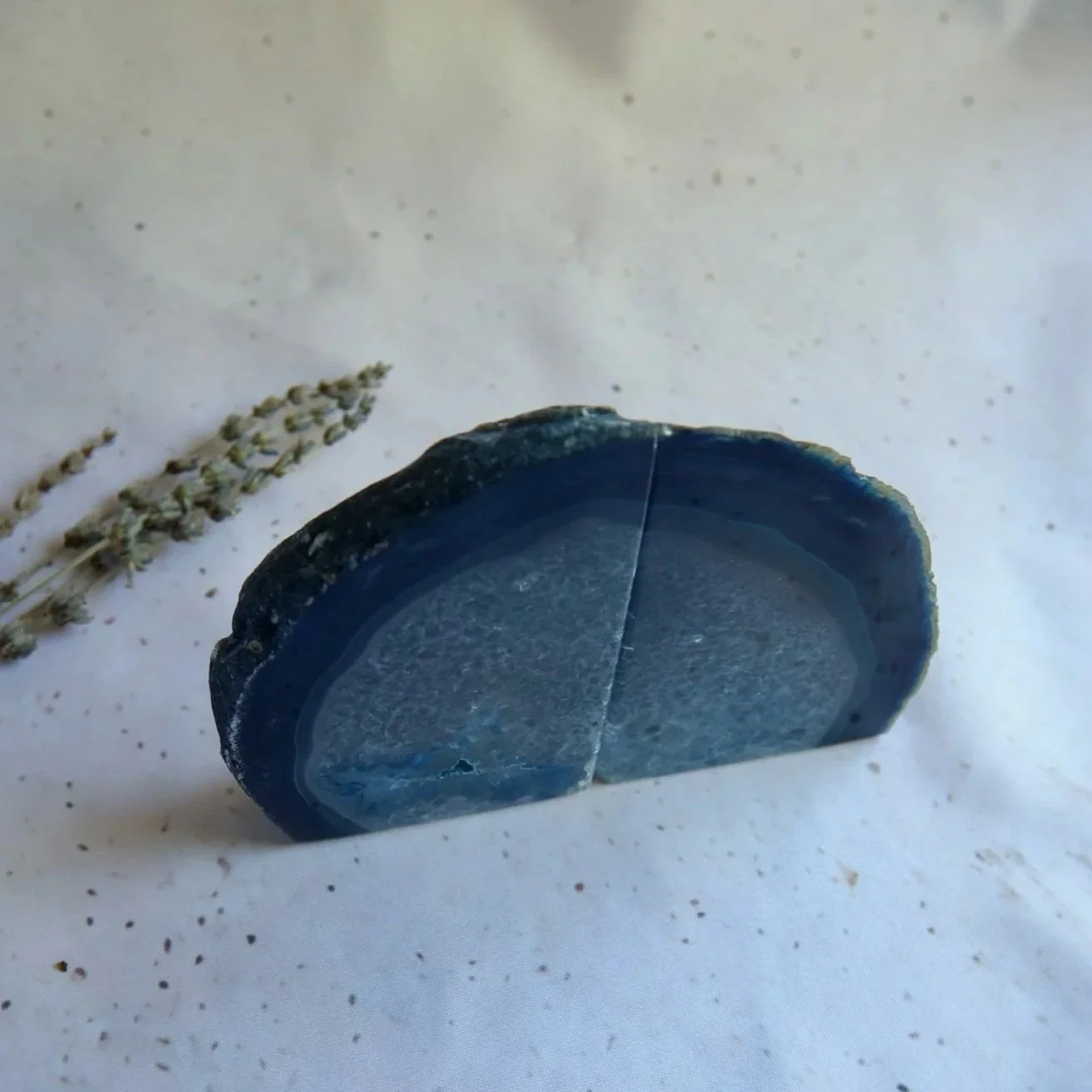 Pair of polished dyed blue Agate bookends with natural patterns