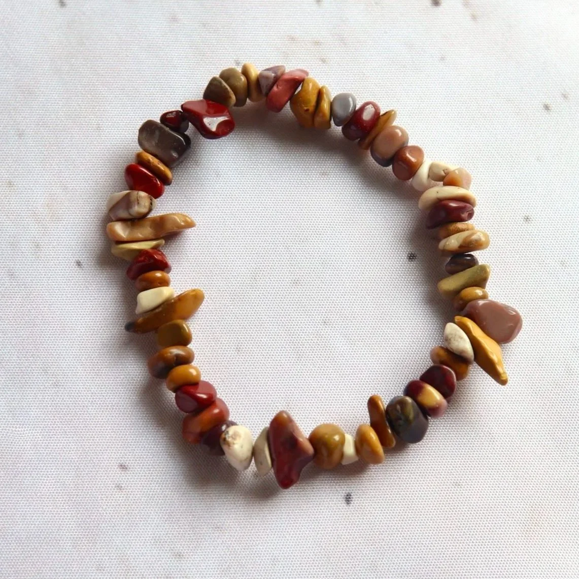 Mookaite chip bead bracelet featuring natural earthy red, yellow, cream and brown tones