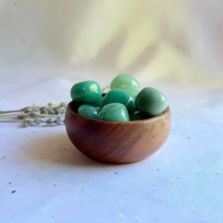 Natural Green Aventurine tumble displaying soft green colouring and polished finish