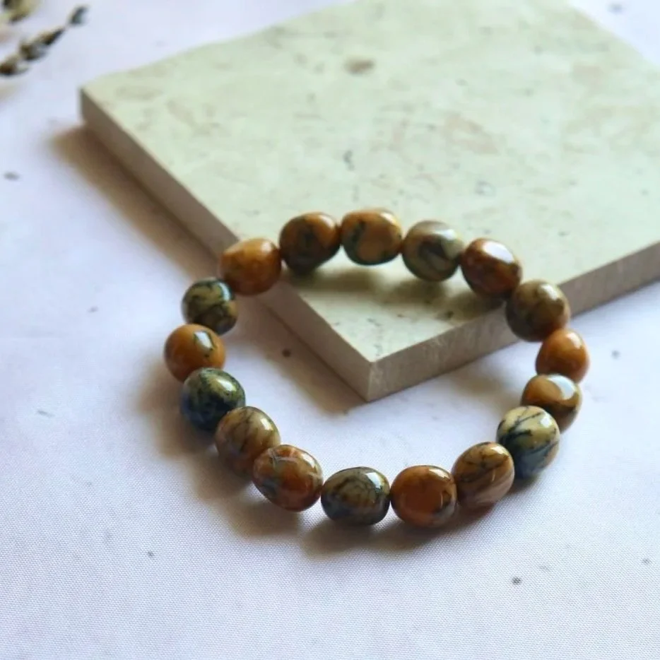 Australian Moss Opalite bracelet displaying unique natural patterns, soft colours and organic mineral variations