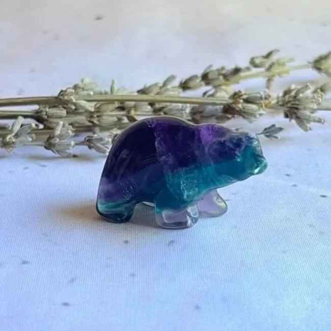 Natural Fluorite polar bear carving measuring approximately 3.5cm long