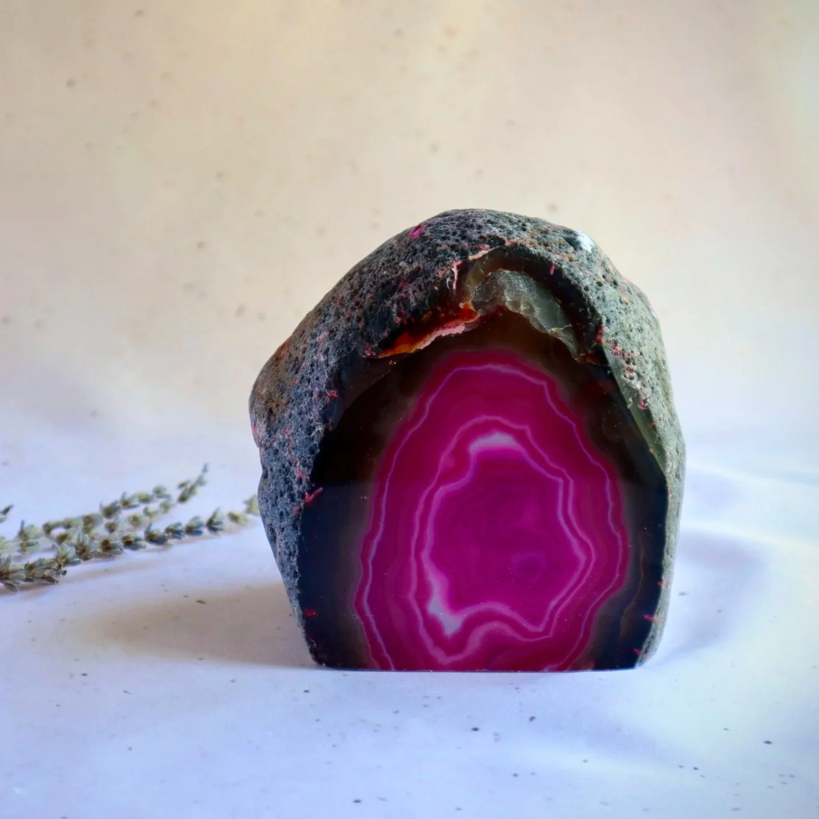 Decorative Pink Dyed Agate tealight holder displaying vivid pink bands and natural stone texture.