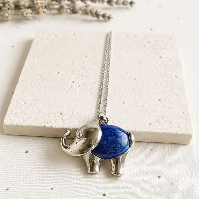 Lapis Lazuli pendant necklace displaying deep blue gemstone colouring and elephant-shaped bail