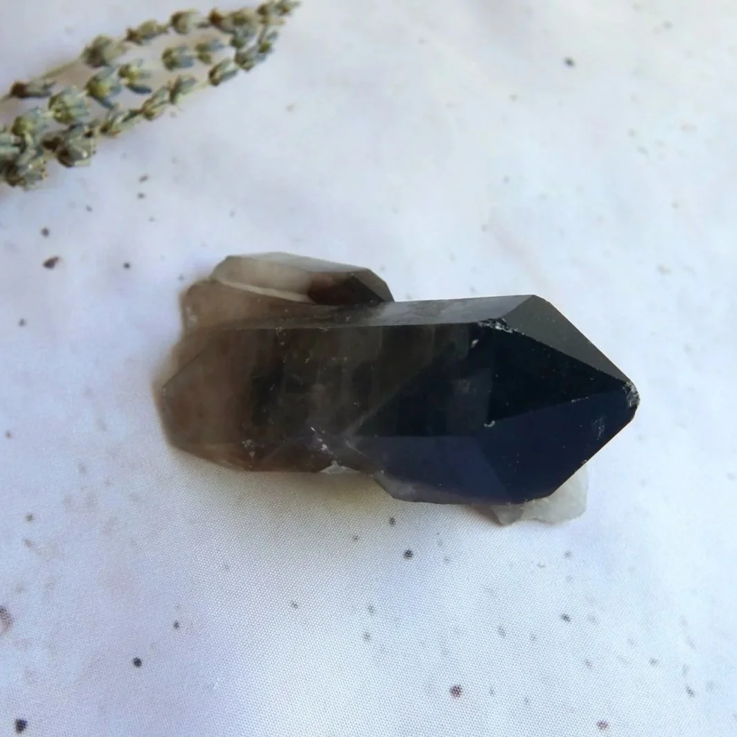 A Grade Smokey Quartz cluster showing earthy brown colouring and natural formations