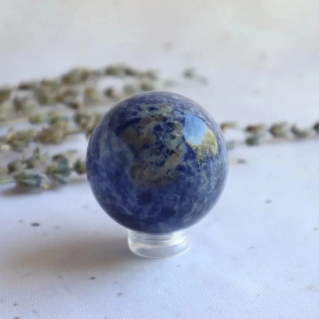 Polished Sodalite sphere with deep blue natural colouring