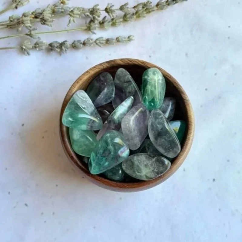 Rainbow Fluorite tumble associated with clarity, focus, intuition, and emotional balance