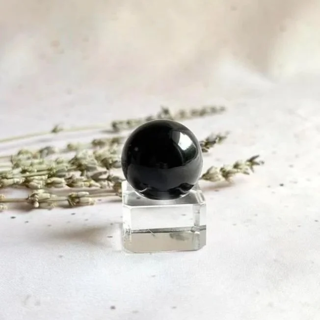 Natural Black Obsidian sphere measuring approximately 2.5cm in diameter
