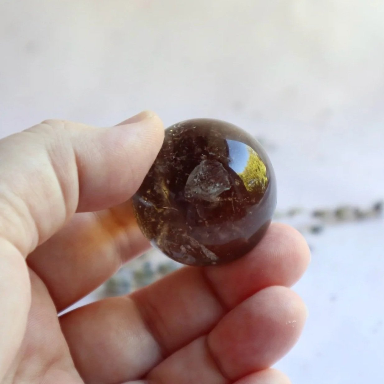 Polished Smokey Quartz crystal sphere approximately 11cm circumference