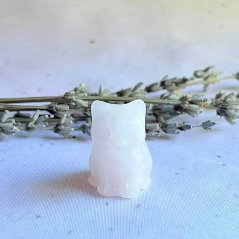 Natural Rose Quartz sitting cat carving measuring approximately 3cm tall