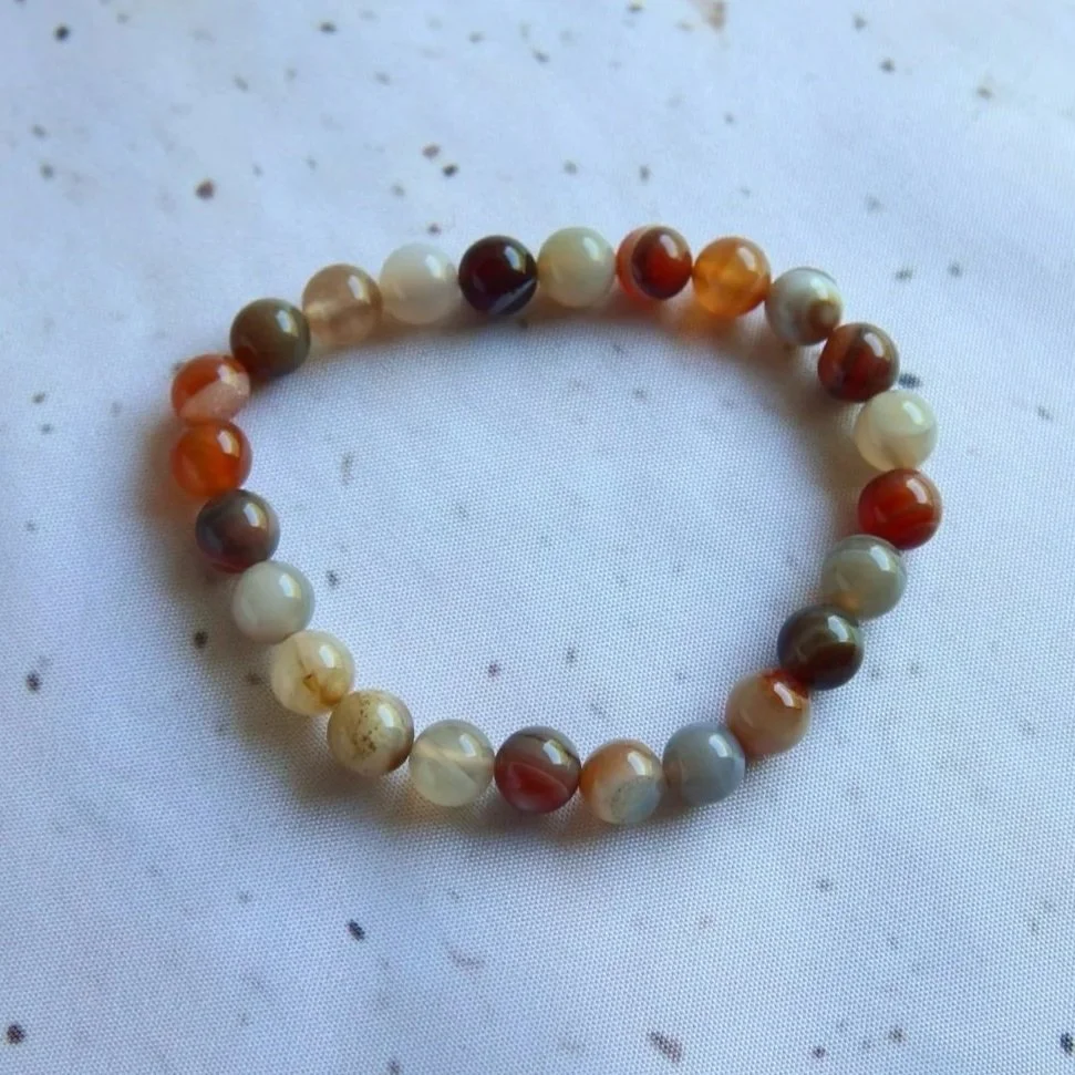 Natural Agate round bead bracelet with earthy natural colouring and patterns