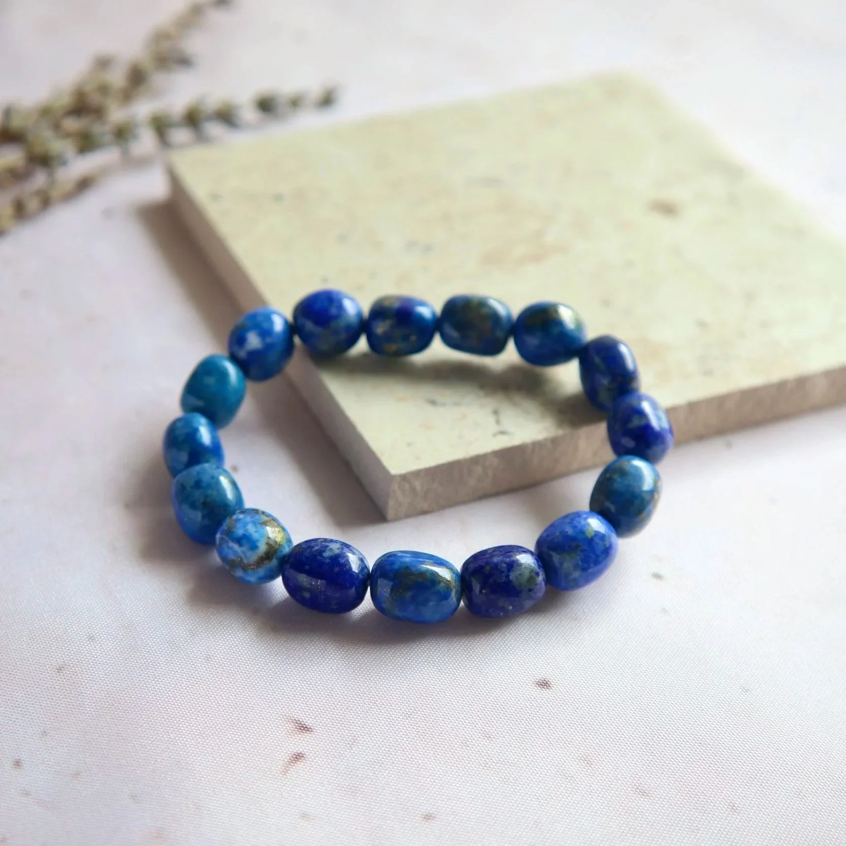 Lapis Lazuli tumble bracelet displaying deep blue tones with natural pyrite flecks