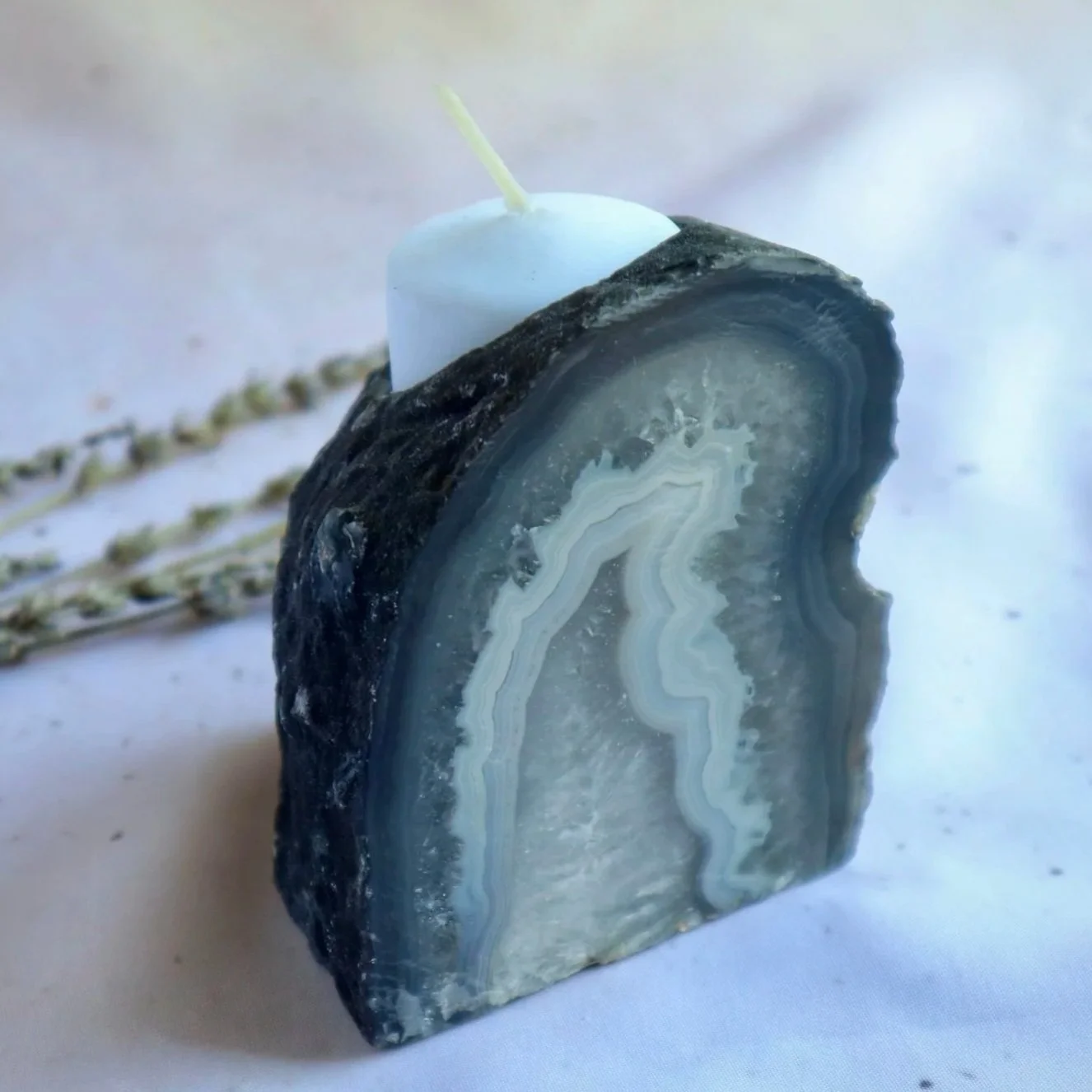 Brazilian grey and blue agate candle holder with beautiful natural fortification banding and polished finish.