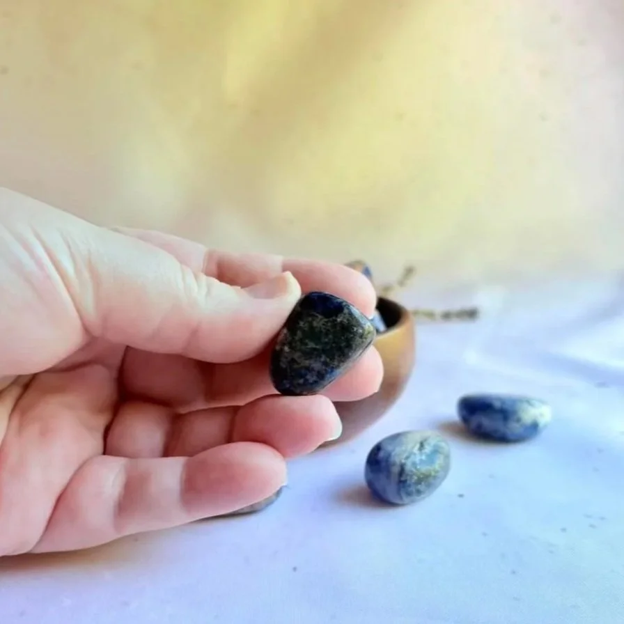 Sodalite tumble in hand