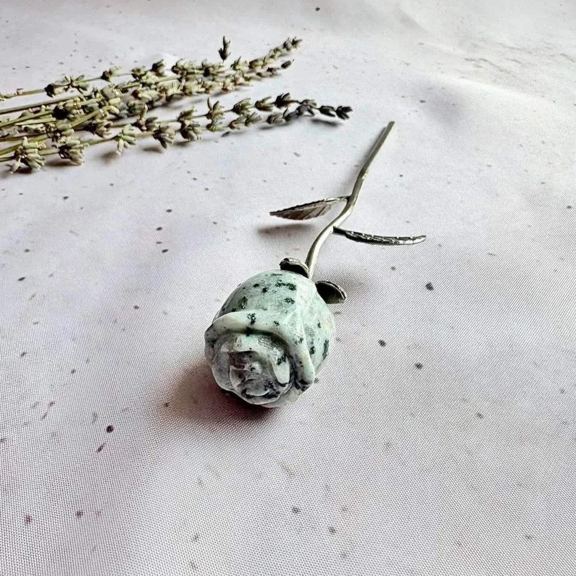 Kiwi Jasper crystal rose with a gold stem and leaf detail