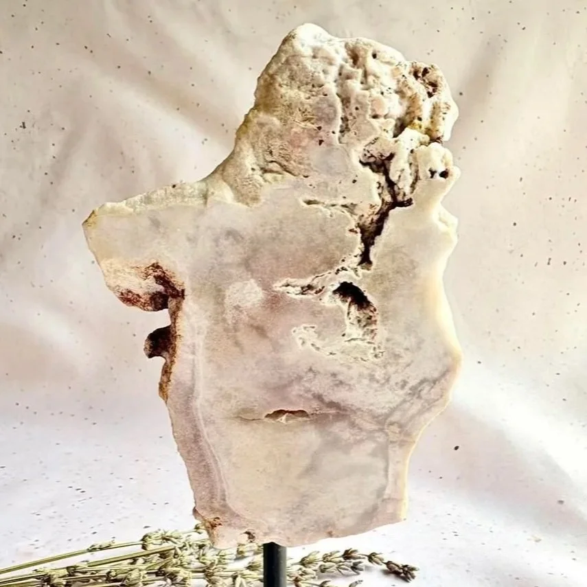 Natural Pink Amethyst display piece featuring soft pink tones and crystal formations