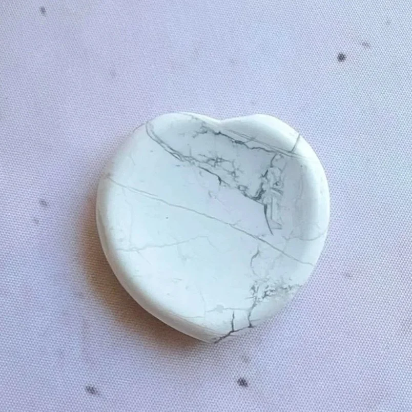 Polished Howlite heart worry stone measuring approximately 4cm