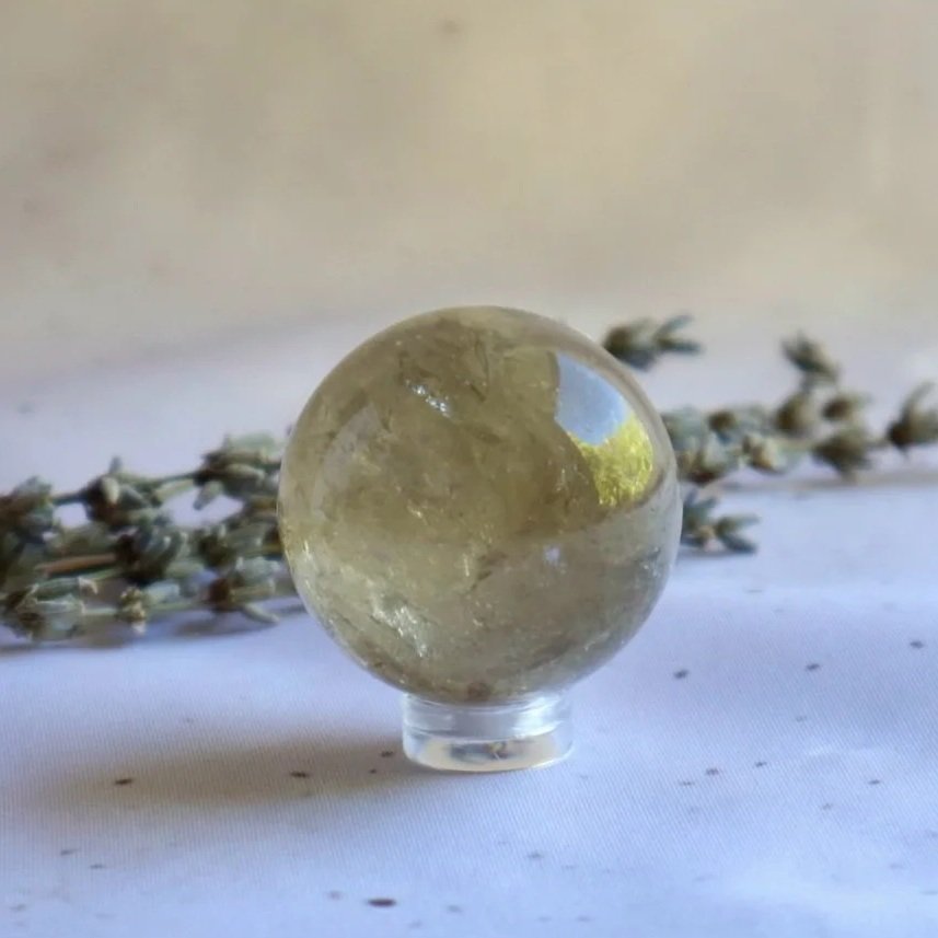Polished natural Citrine sphere with warm golden colouring