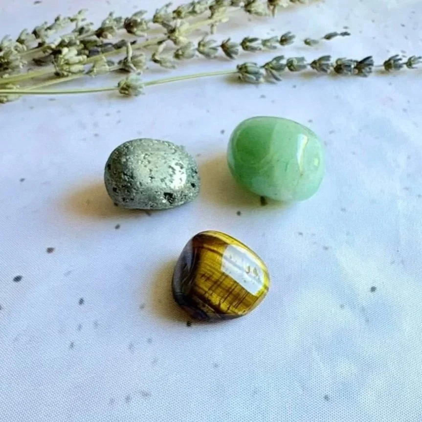 Crystal pack featuring Green Aventurine, Tiger's Eye, and Pyrite for prosperity