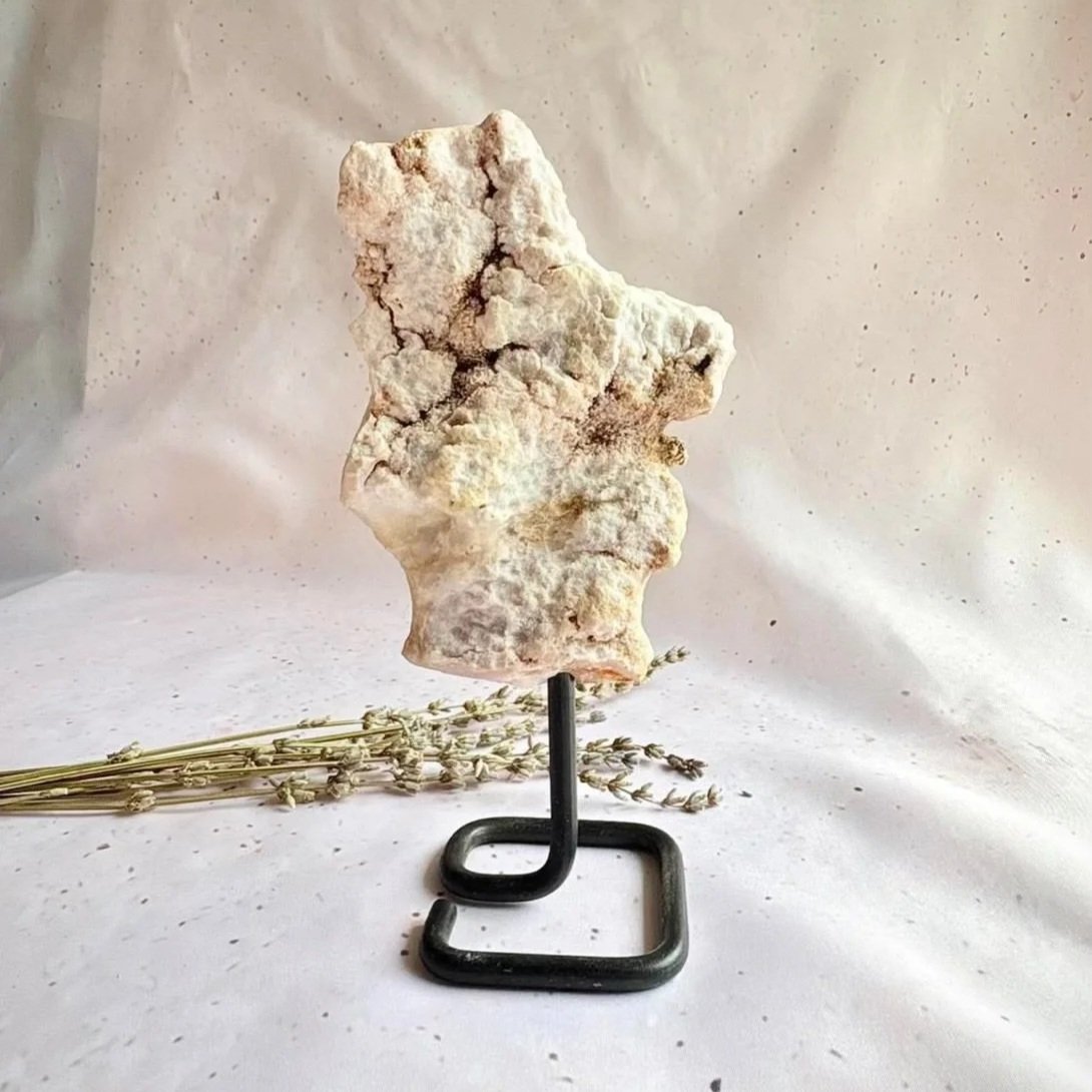B Grade Pink Amethyst slab permanently attached to a display stand