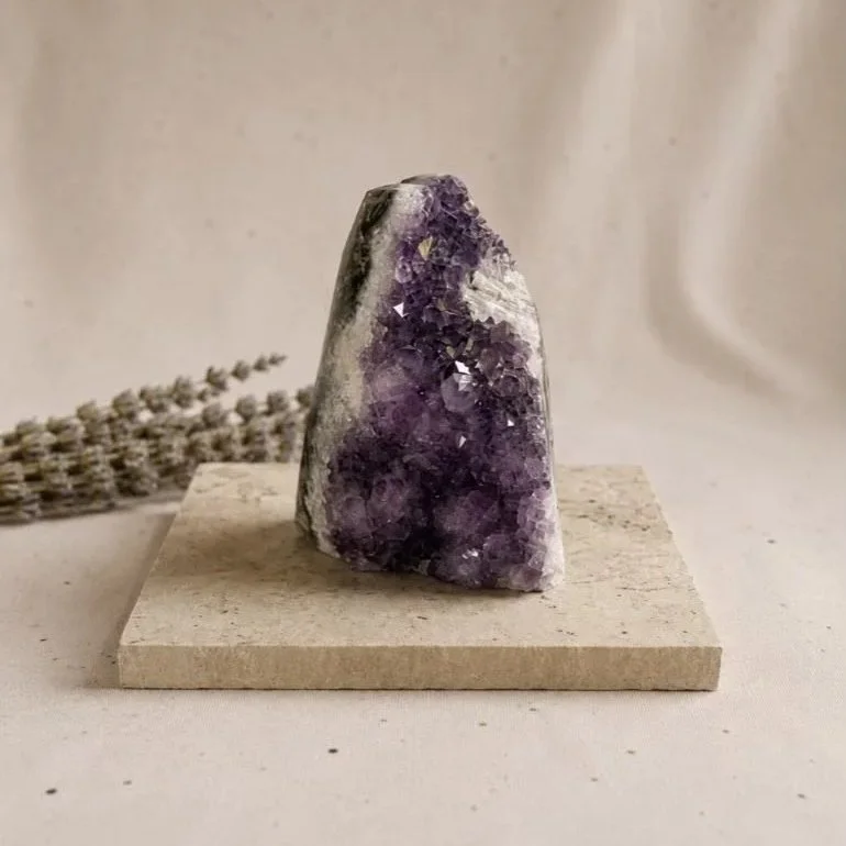 Natural Amethyst crystal cluster approximately 7cm tall with sparkling purple points