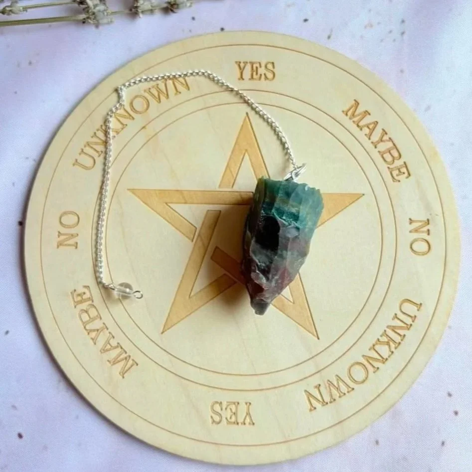 Natural rough Bloodstone crystal pendulum with silver-coloured chain
