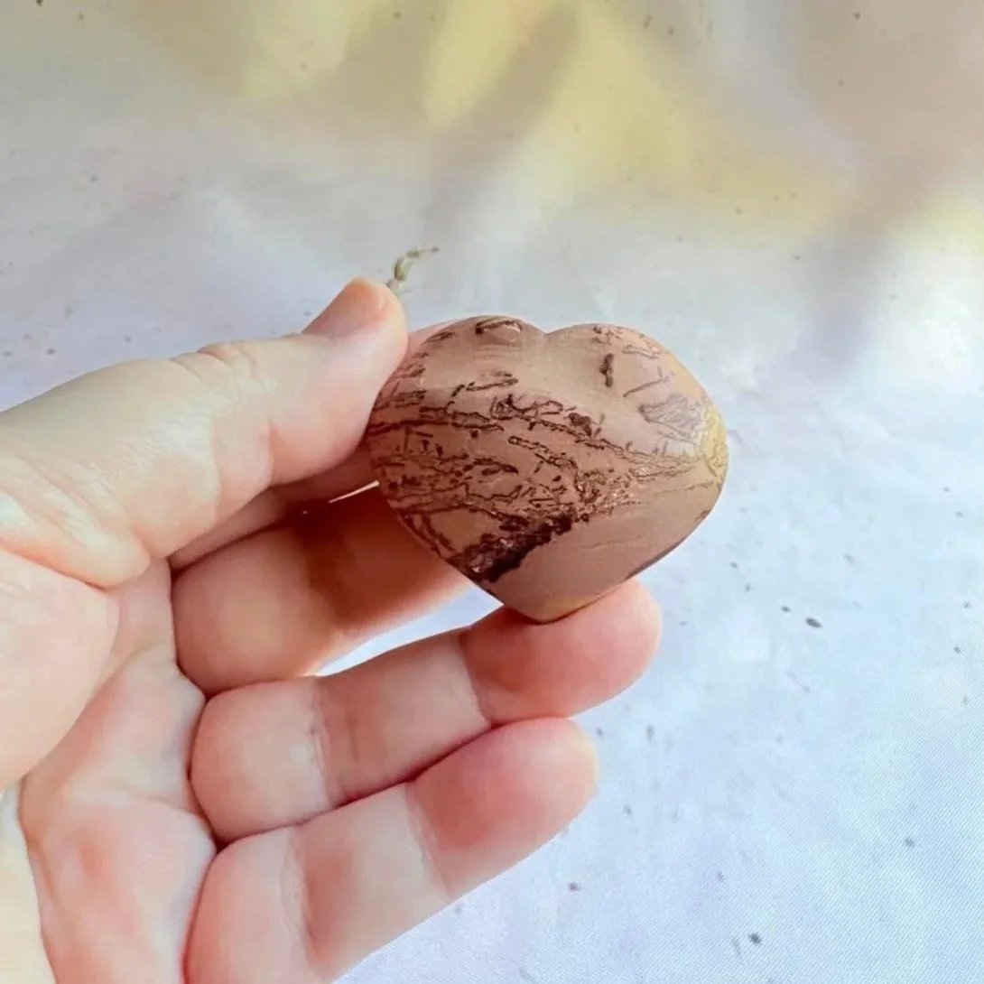 Picture Jasper heart associated with grounding, creativity, and connection to nature