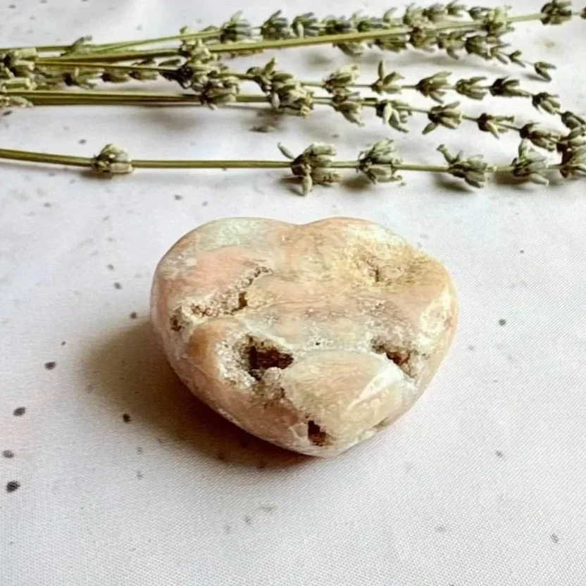 Natural Pink Amethyst crystal heart displaying soft pink colouring-compressed.jpg