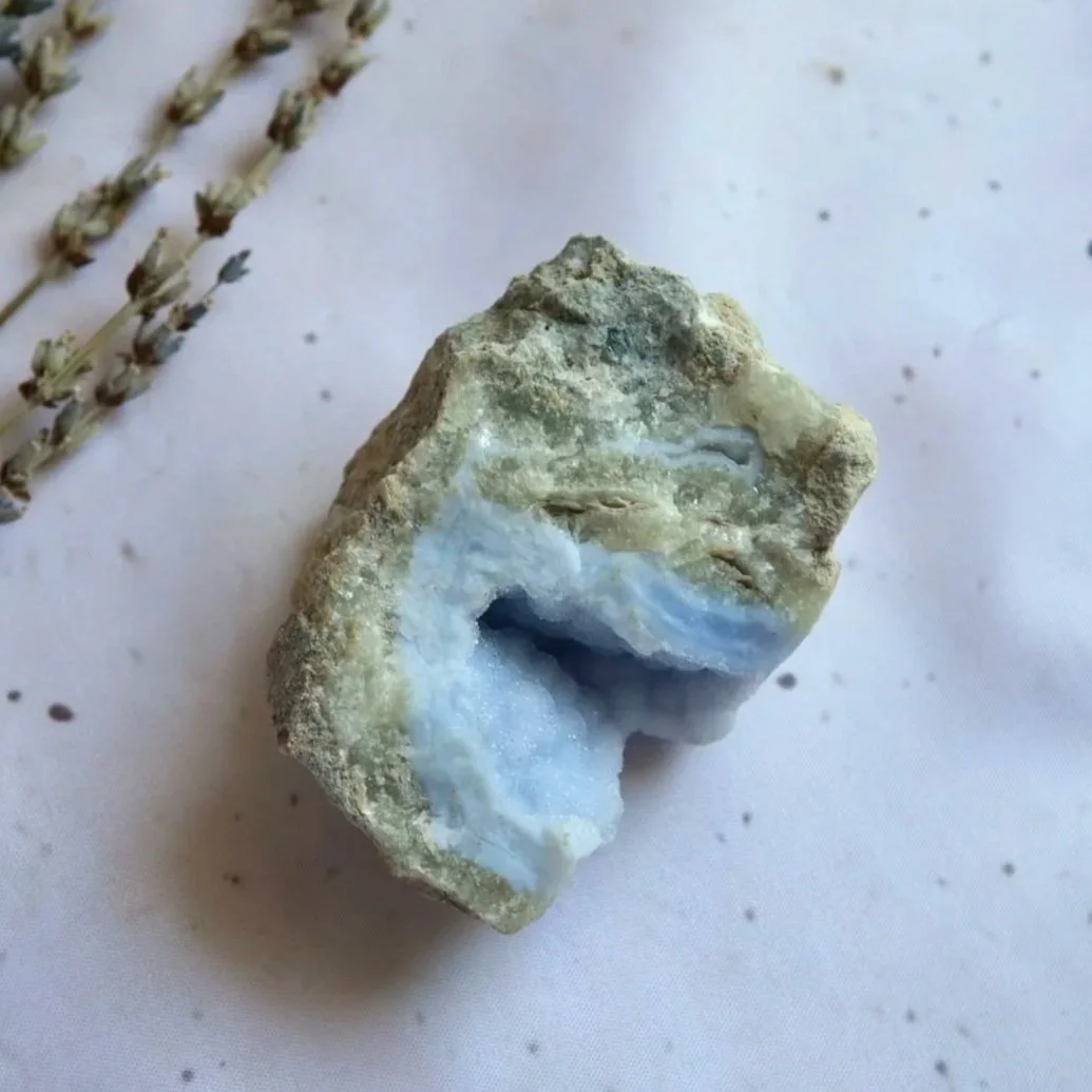 Exact Blue Lace Agate geode with a natural cavity and delicate blue crystal texture