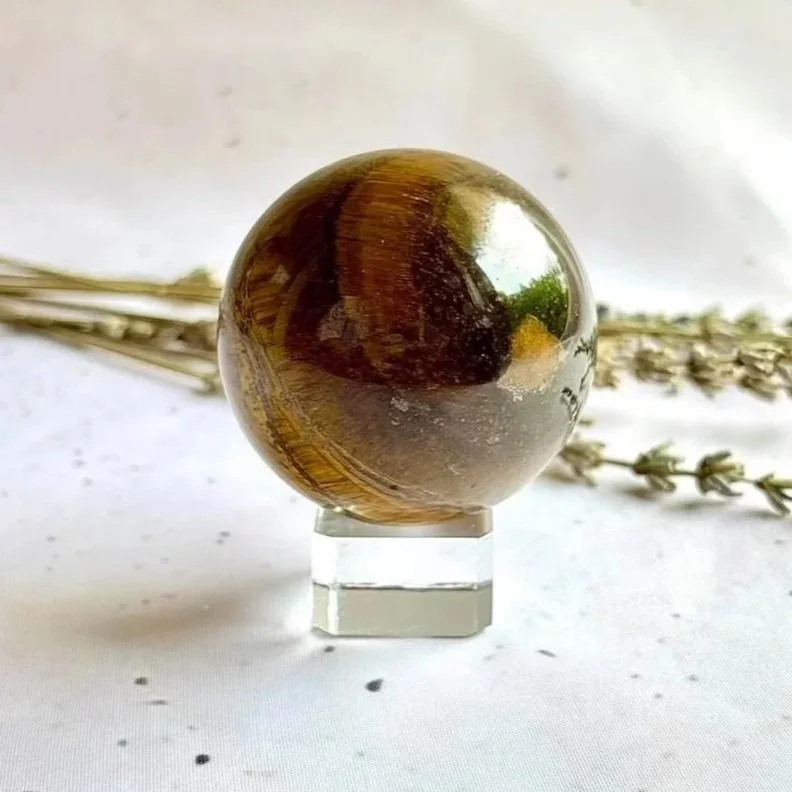 Natural Tiger's Eye sphere measuring approximately 5cm in diameter