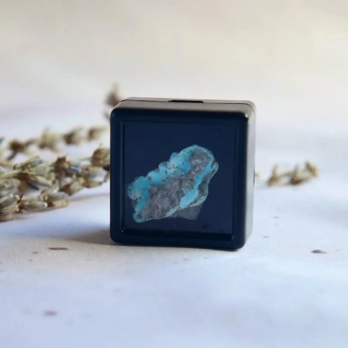 Castle Dome Turquoise mineral specimen presented in a small display box