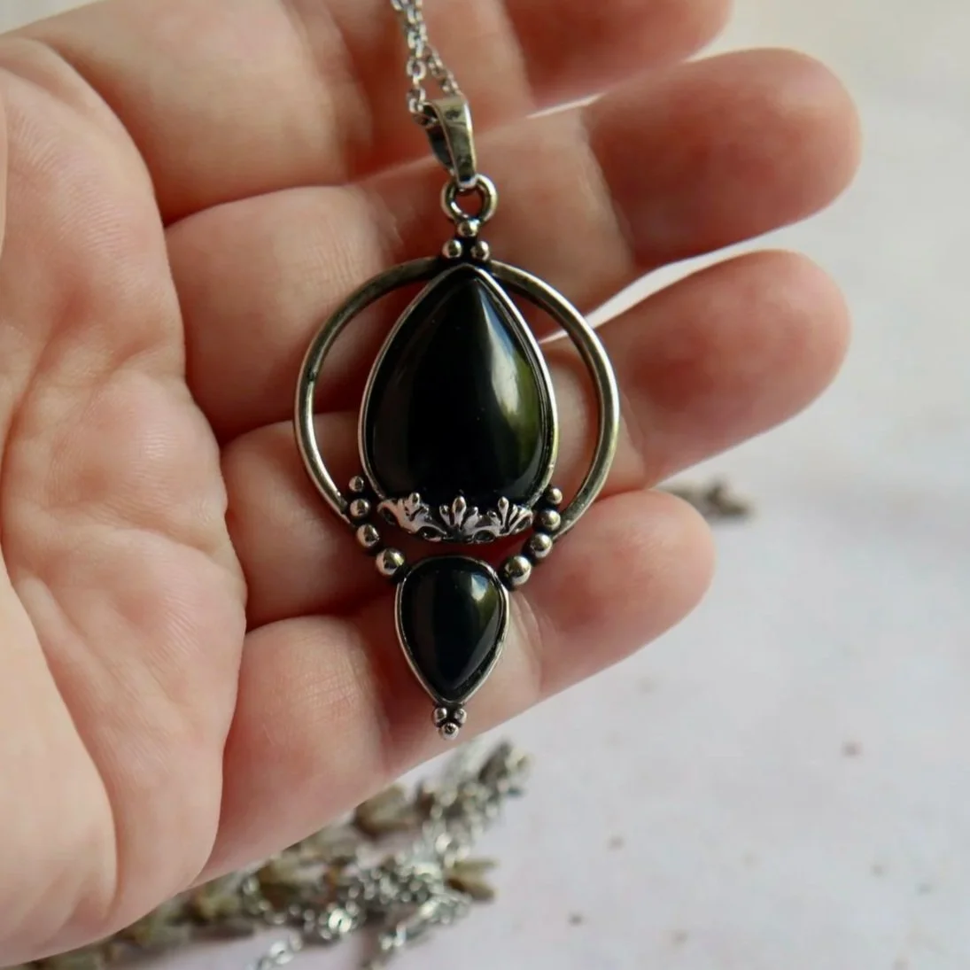 Black Onyx crystal necklace with stainless steel chain and decorative mount
