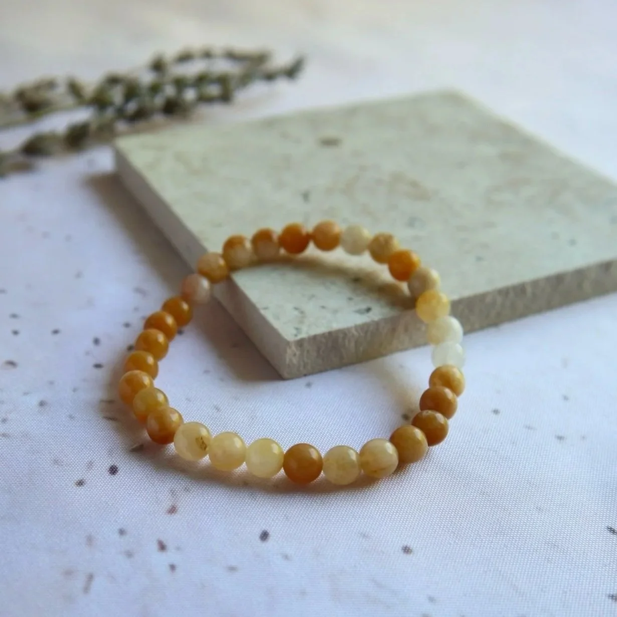 Golden Healer crystal bracelet made with natural round beads