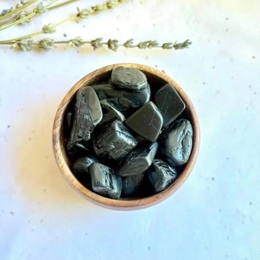 Black Tourmaline tumble associated with protection, grounding, strength, and stability