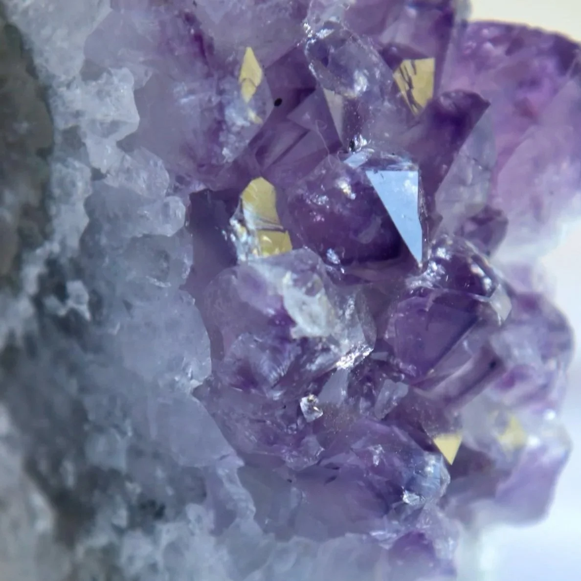 Close-up of the natural crystal points and purple colouring of an Amethyst Cluster